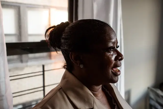 Karen Johnson, who says she was a victim of a years-long tenant harassment and sabotage scam by East New York landlord Yaniv Erez, in her new apartment in the Bronx.